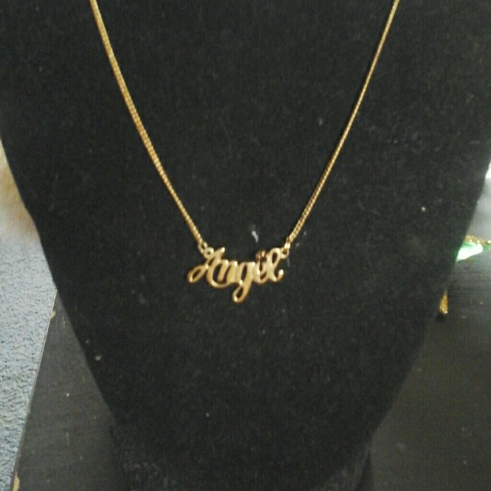 Avon angel  necklace nib